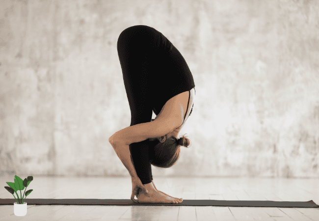 Standing Forward Bend yoga pose for kamar dard